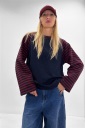 maglia bicolore con manica a righe leila